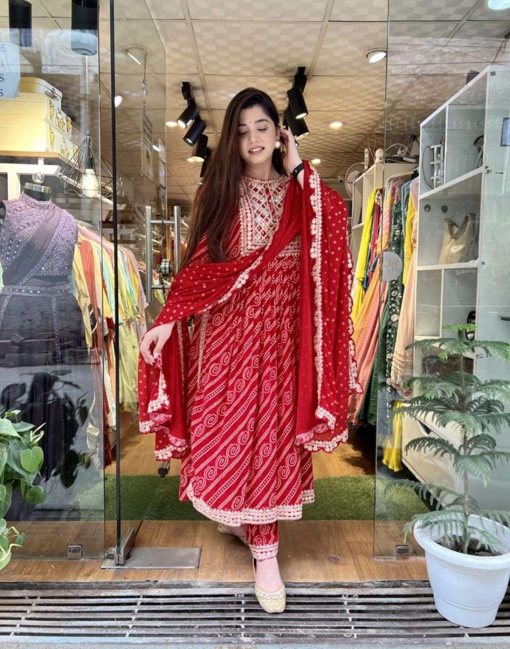 red love beautifull bandhani printed straight kurtie side cut with pant and duppta reyon cotton kurtie with pant and duppta 