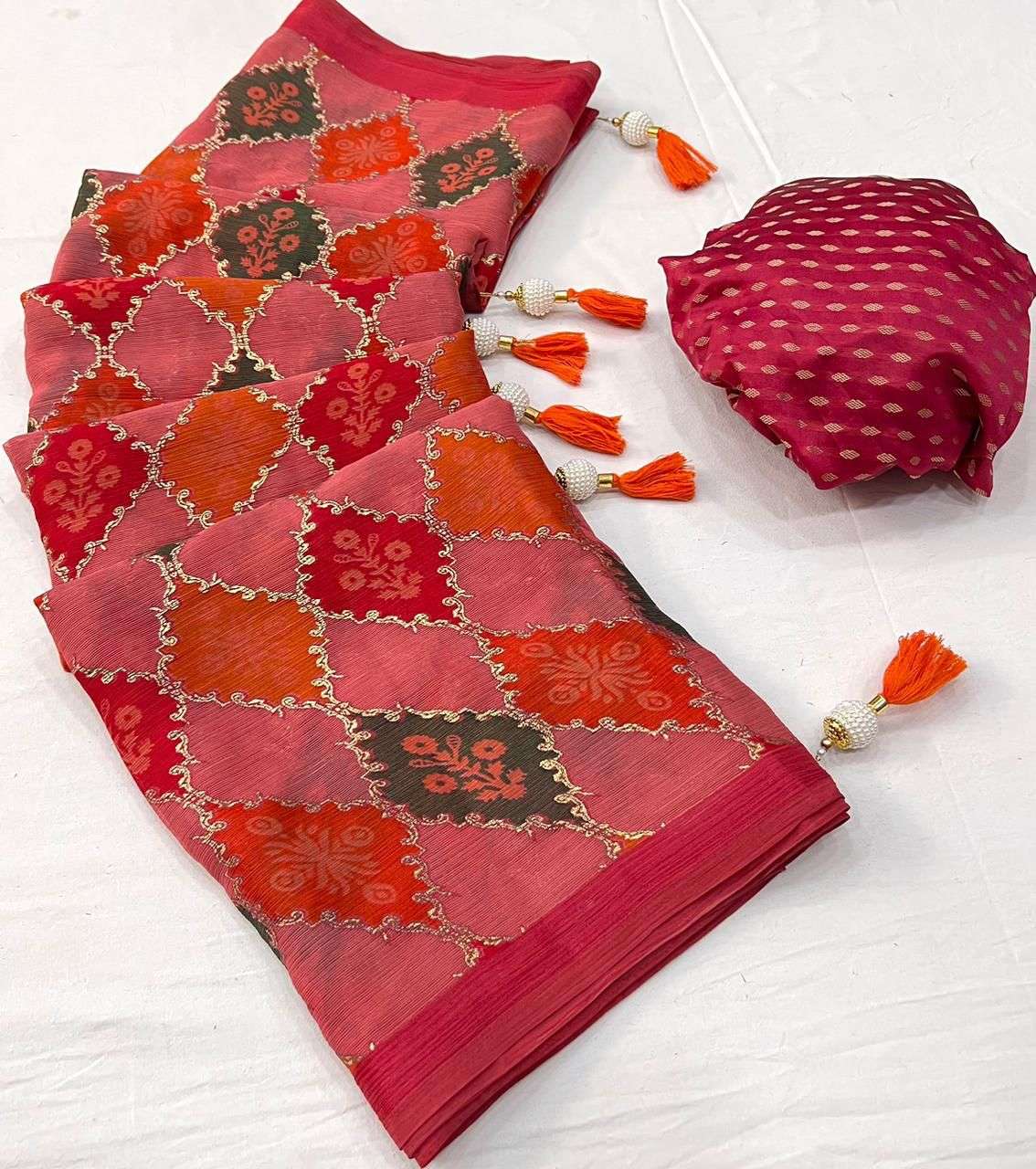 catalogue bindaya weaving brasso with foil print heavy tussles and weaving bordar with jaquard weaving blouse saree collection