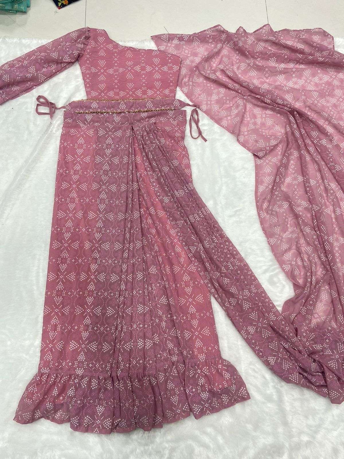 instagram influencers light peach colour  ready to wear saree lehenga premium georgette embellished with beautifull hand rubber print with ruffle lehenga saree