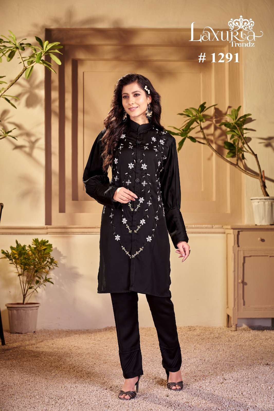 black colour coord set laxuria trendz design number 1291 tunic with gorgeous handwork sleeves in pattern n glamours tassels button paired with overlapping pearl handwork with pants coord set for women  