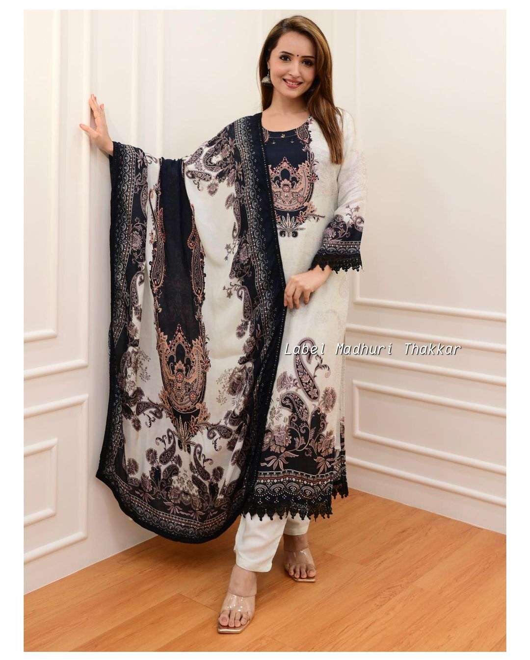 black grey classic print pakistani suit ivory and black pakistani suits which are beautifully decorated with digital prints sequin embroidery and lace detailings