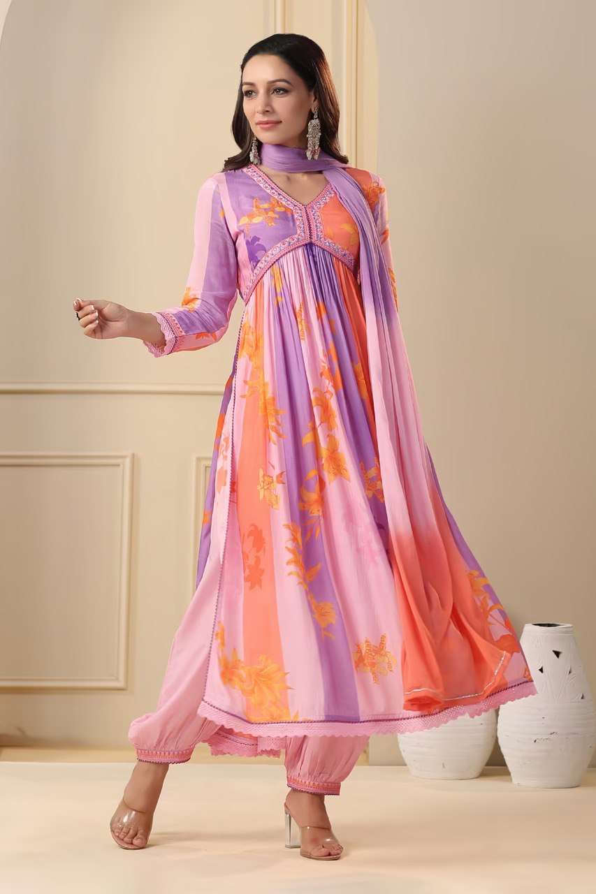 pink colour alia cut lights muslin alia cut suit set which is beautifully decorated with intricate hand embroidery zari weaving and prints it is paired with matching pants and lace dupatta  