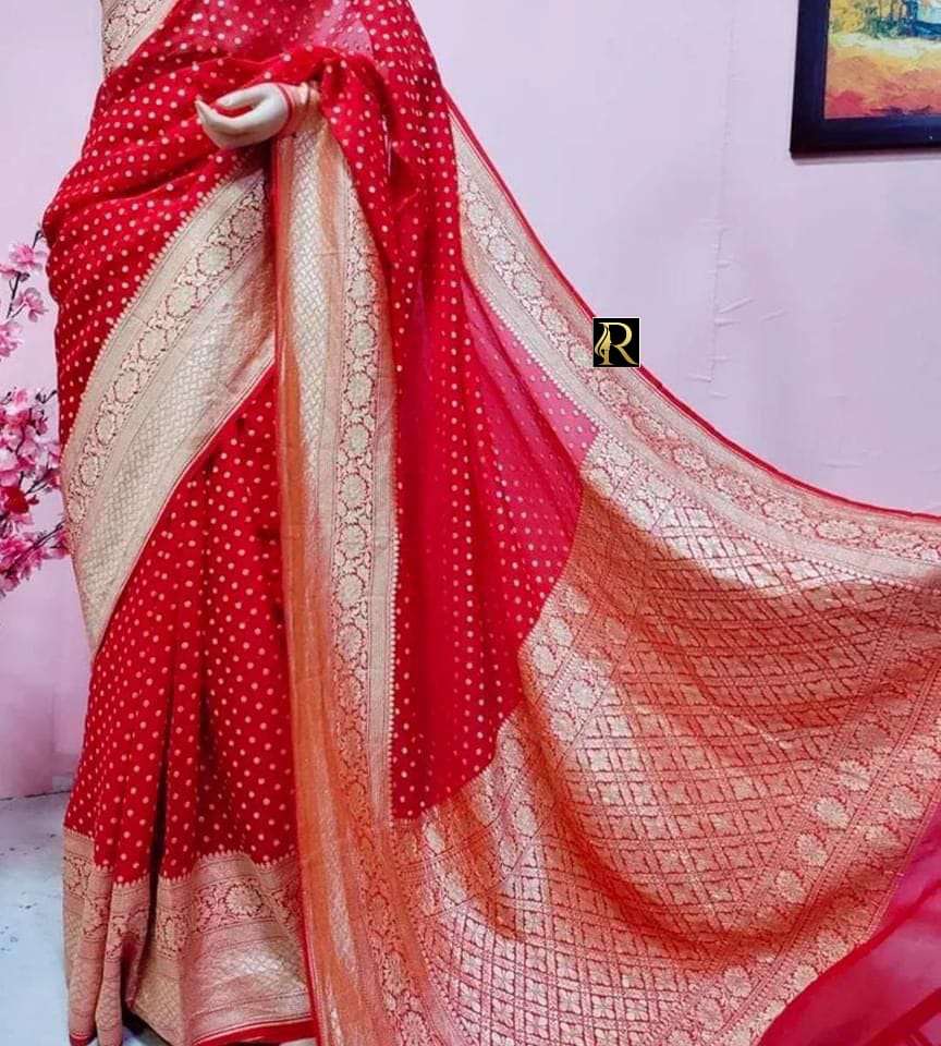 soft flowing khadi georgette silk sarees with bindi weaving body and zari woven pairs ad with tassels designer partywear saree  