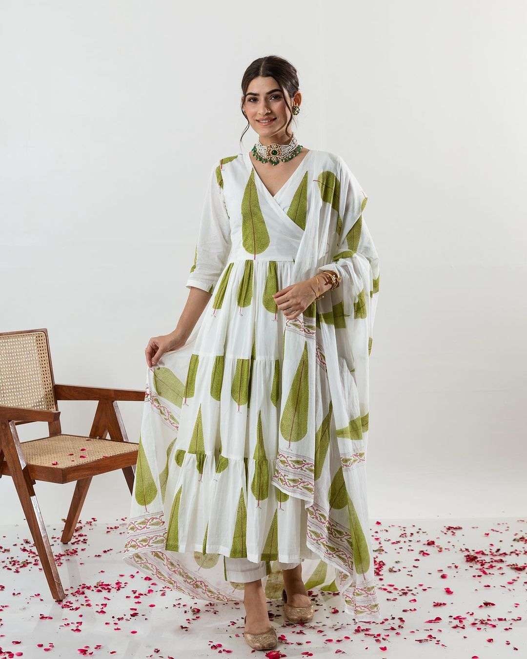 hand block printed 3 piece set an angrakha style tiered kurta in jungle green cypress print it is paired with green cypress pants readymade suit collection  