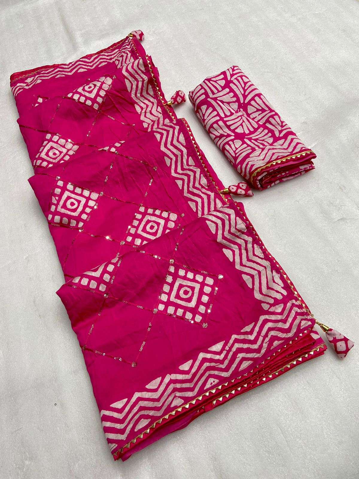 new launch batik print seqance star fabric exclusive latest design in batik print in cotton with seqance butta in all over saree with beautiful eye attractive batik print with gorgeous look latkan nd border 