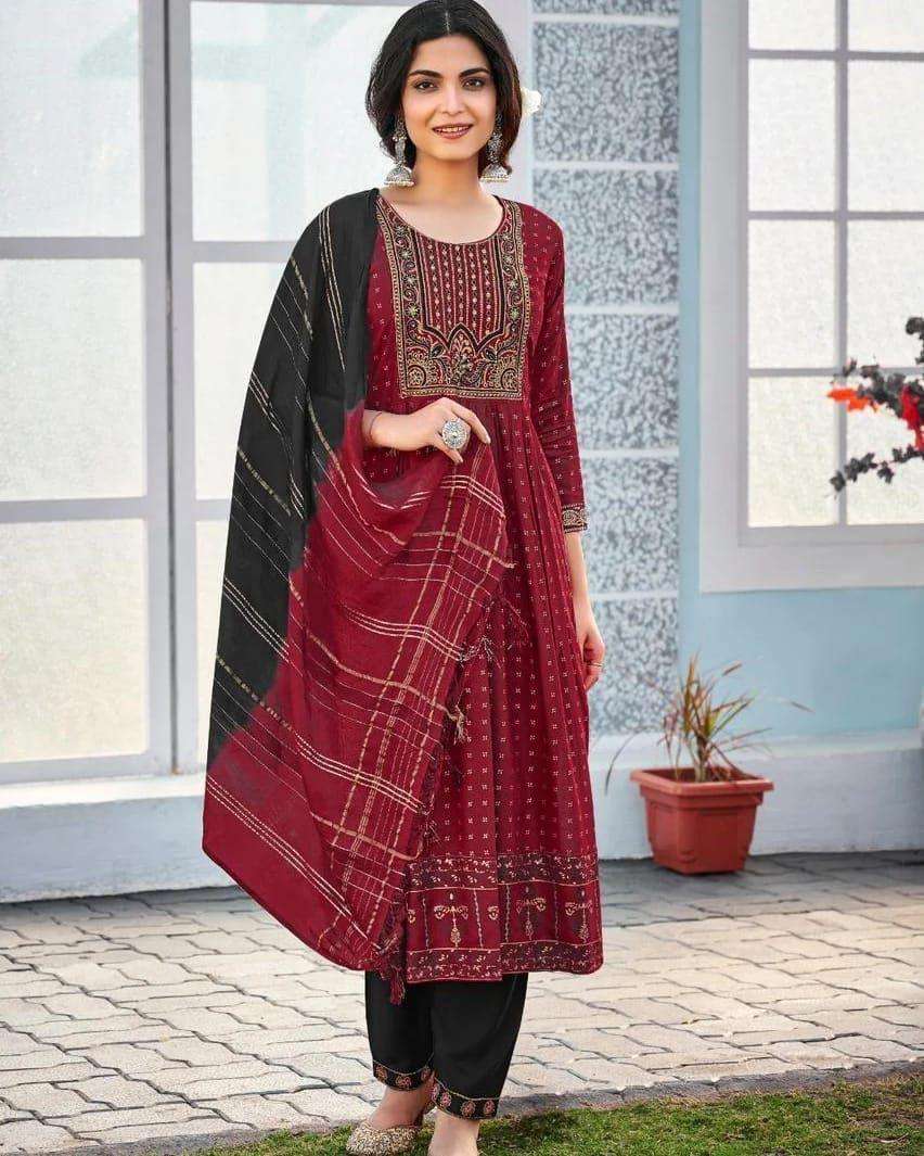 rangjyot by siya dresses launches rangmanch designs 8 pcs top heavy rayon 14 kg with gold print and hand work pent rayon 14 kg with embroidery work dupatta chanderi dupatta  