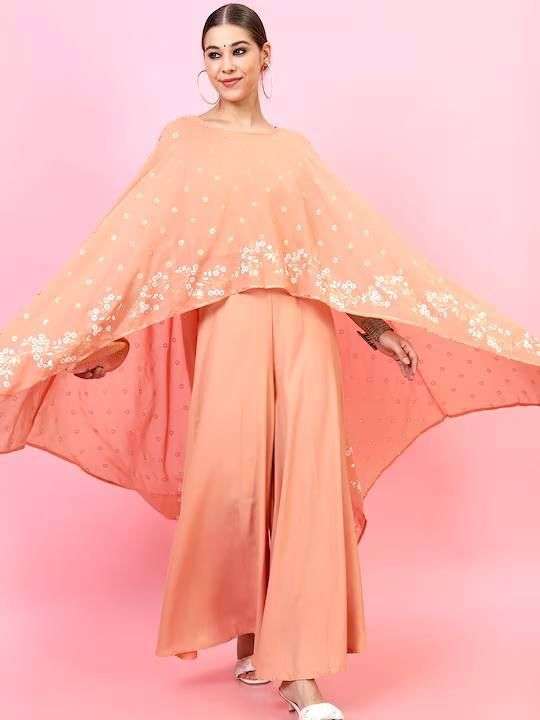 844 peach pounch set poncho dress fusing the best of ethnic and modern sensibilities our gorgeous peach pounch set embroidered georgette dress is super suave 