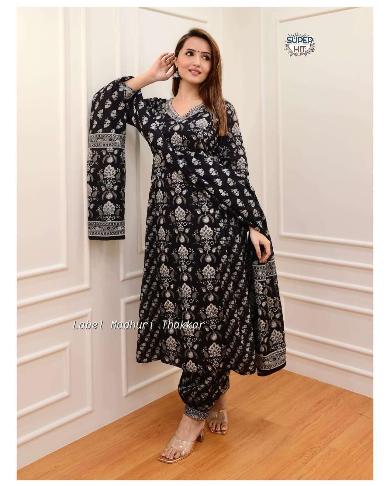 look straight out of a dreamy movie set as  you turn around and walk in this elegant flaired suit the perfect of traditional wear new straight kurta set with new style in saganeri block  print 
