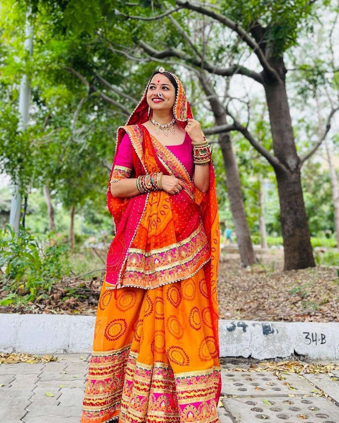 saree catalogue nikita saree moss chiffon saree with beautiful half half bandhani print n heavy gota patti work border in saree designer saree 