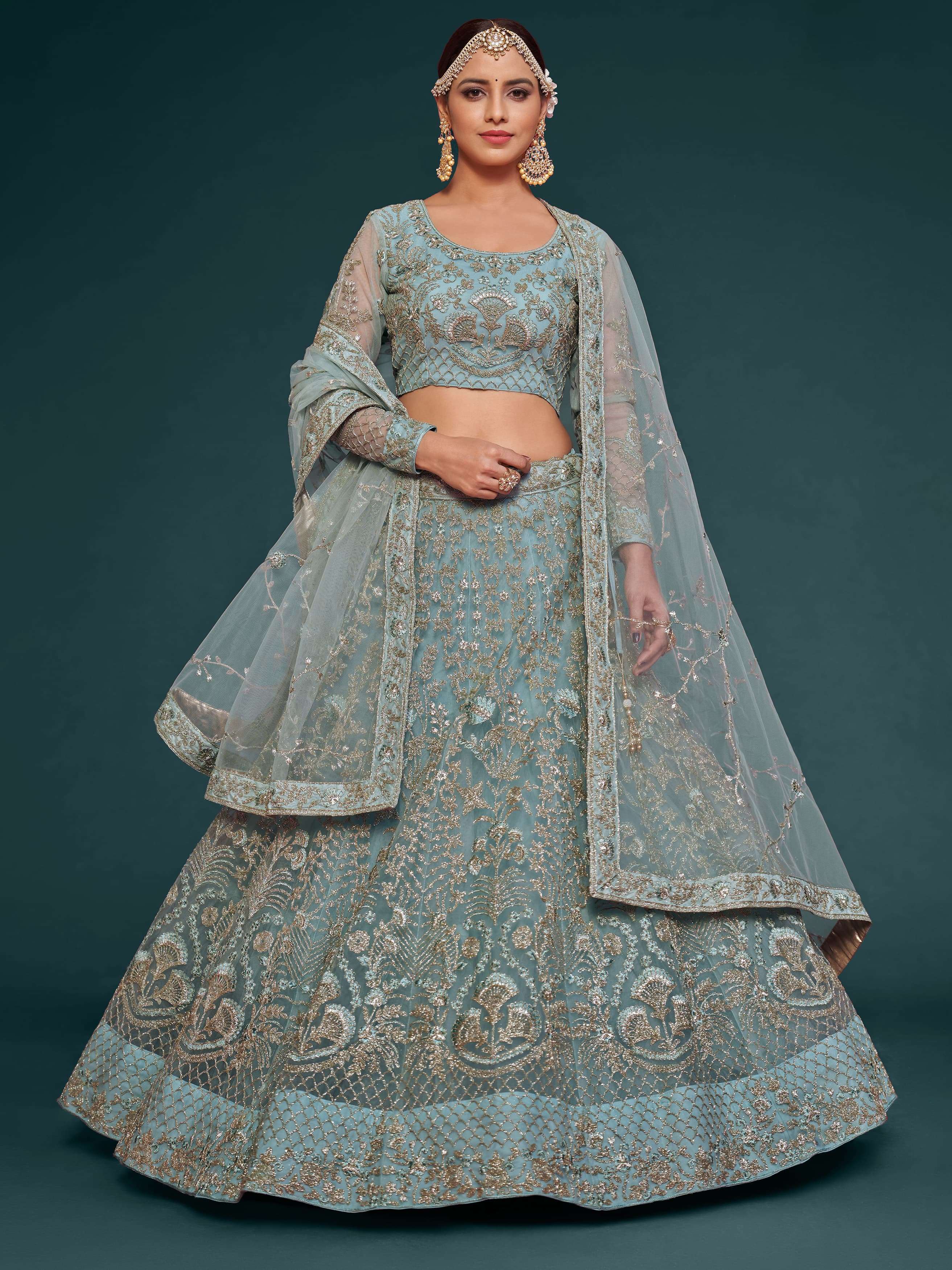 wedding lehenga in wholesale price heavy bridal lehenga choli product code 7906 style and design and trend would be at the peak of your splendor as soon as you dress in this aqua blue color soft net lehenga