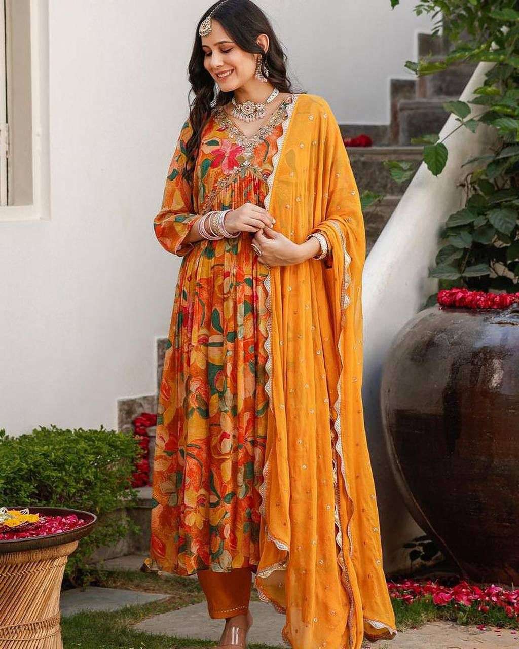853 ladu pila hw experience the softness and comfort of fabric paired with a sparkling yellow sequence duptta and printed alia cut combination readymade aliacut suit 
