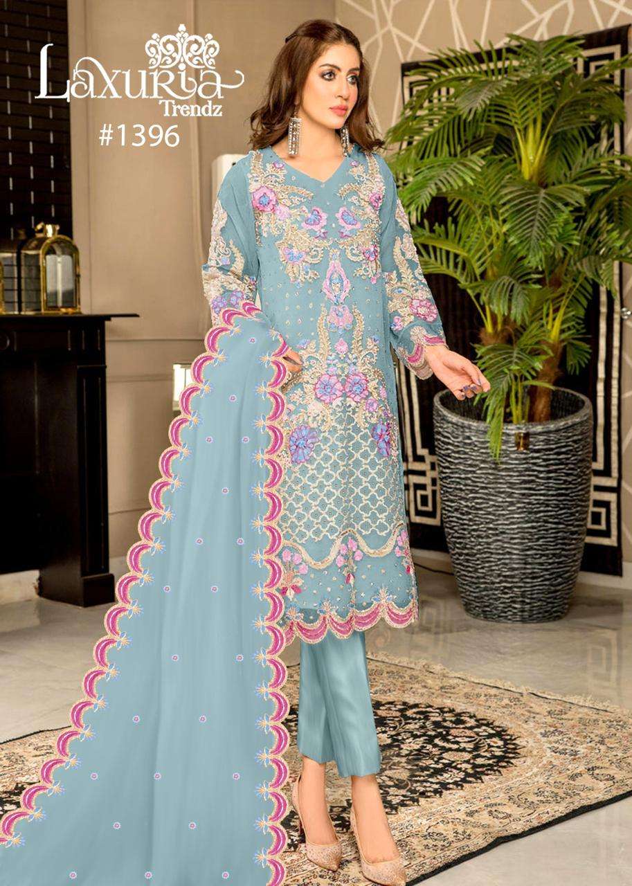 laxuria trendz design number 1396 readymade pakistani suit liac pink n turquoise blue shade enhanced with intricate long shirt embroidered front n floral decorated with handwork tunic