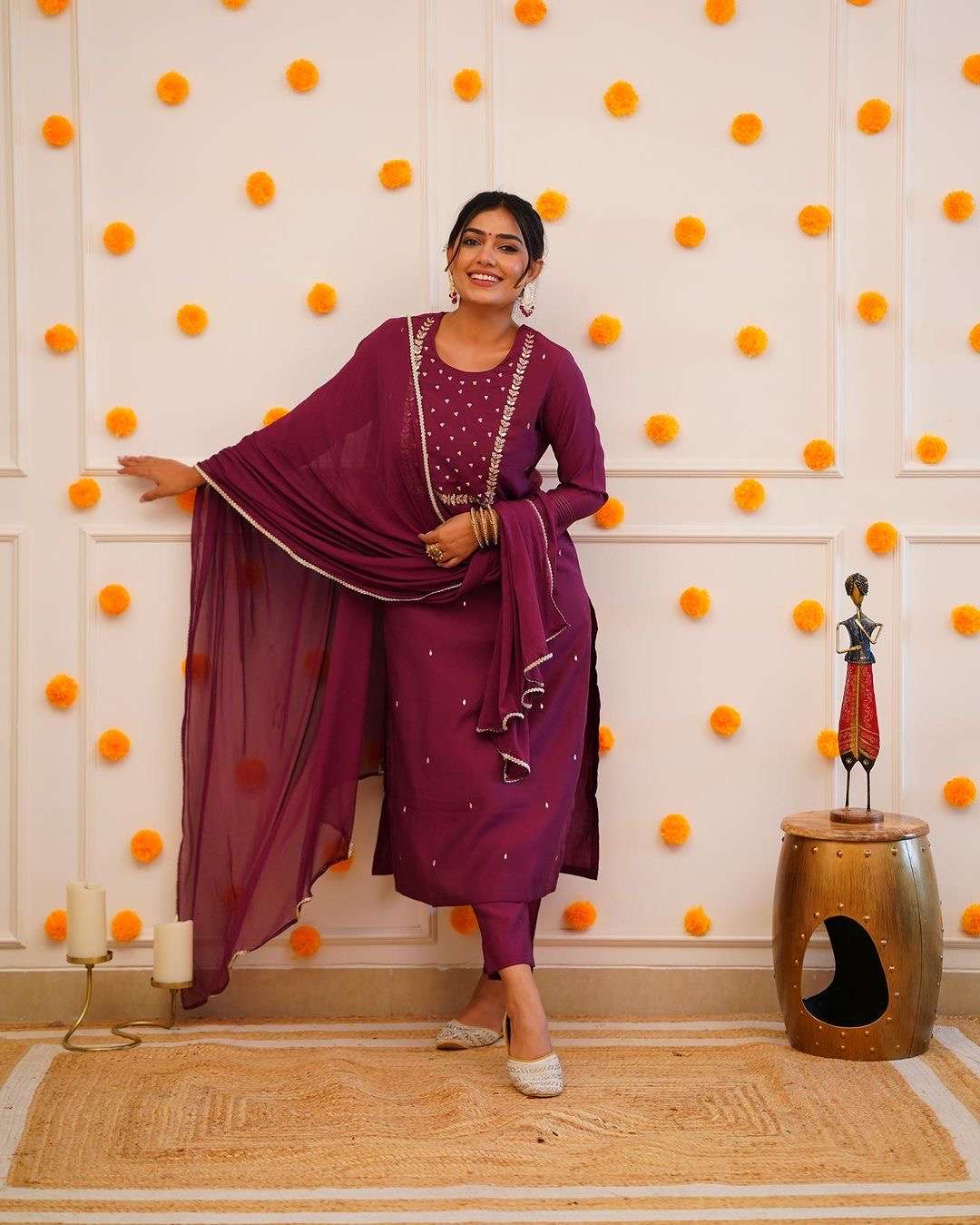embroidery work on nack and all over kurti and beautiful full work on sleeve heavy suit set which is beautifully decorated with intricate embroidery work on nack . it is paired with matching pants
