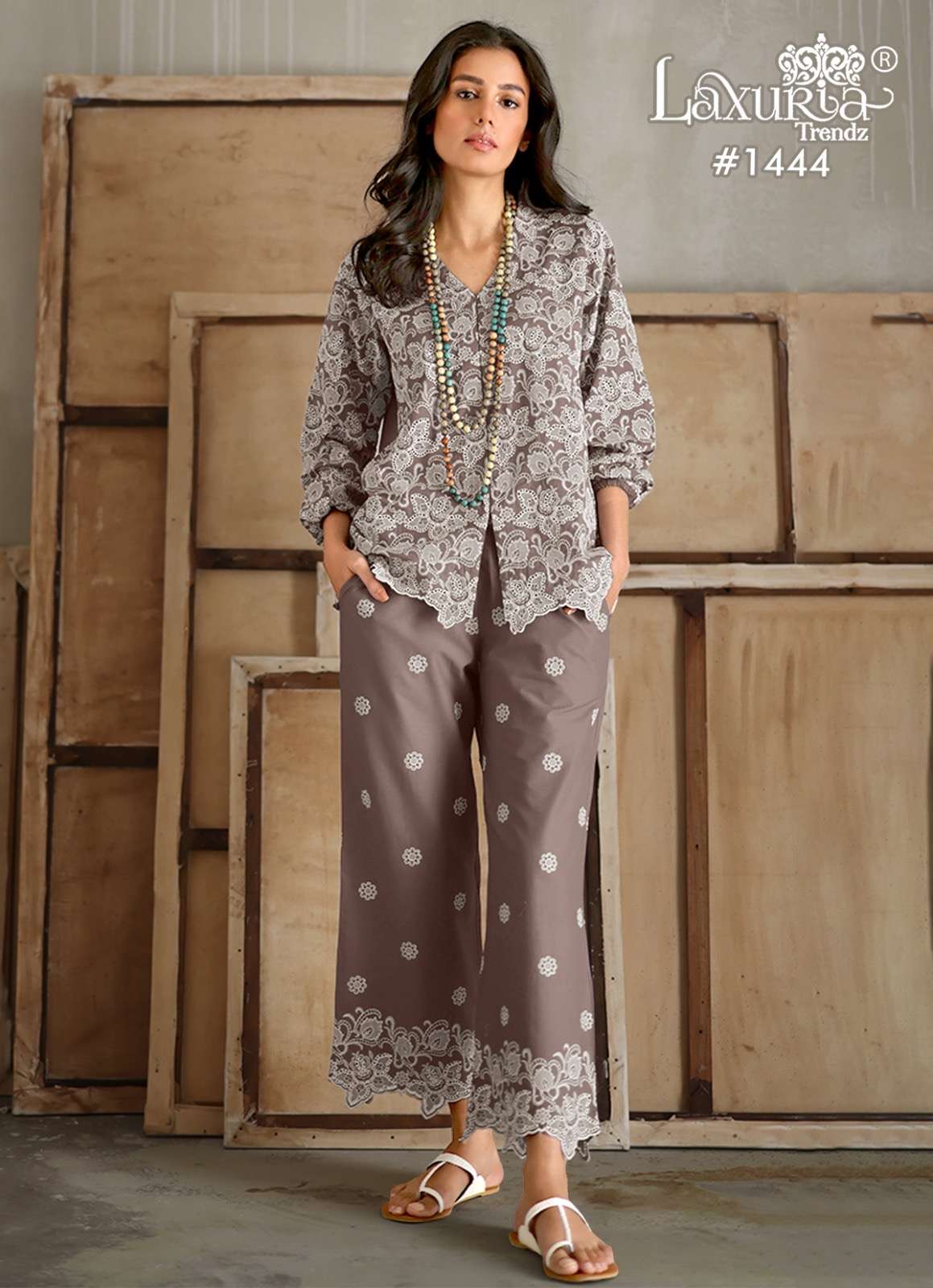 laxuria trendz design number 1444 designer tunic with gorgeous heavy board embroidery tunic n sleeves also in board embroidrey  n glamours paired with embrdry plazo with cutwork