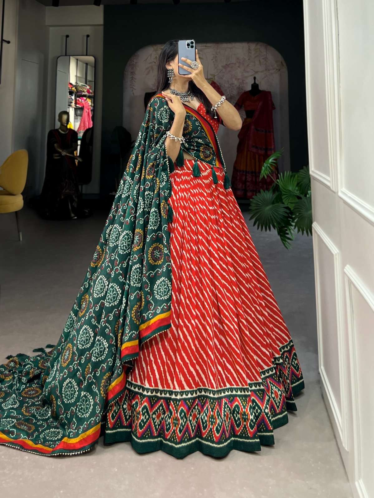 lehenga choli embrace cultural grandeur with our elegant leheriya print tussar silk lehenga choli featuring a gorgeous patola print border and an exquisite bandhani print dupatta catalogue aadvika 2