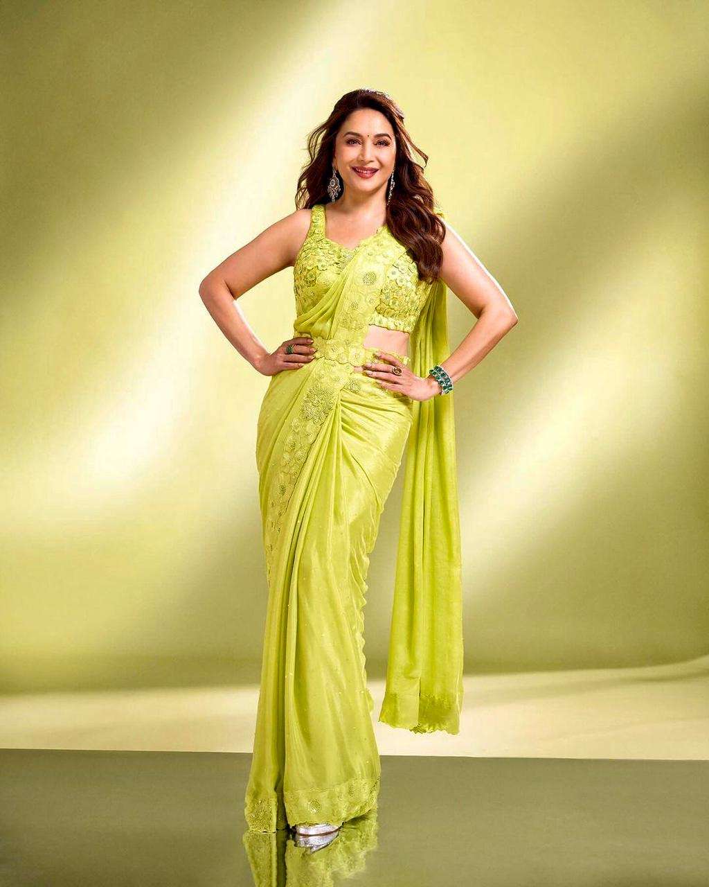 new madhuri dixit designer party were saree design number bt 1224 saree detail saree fabrics heavy soft georgette beautiful embrodery fancy work in lace border with cut work border saree