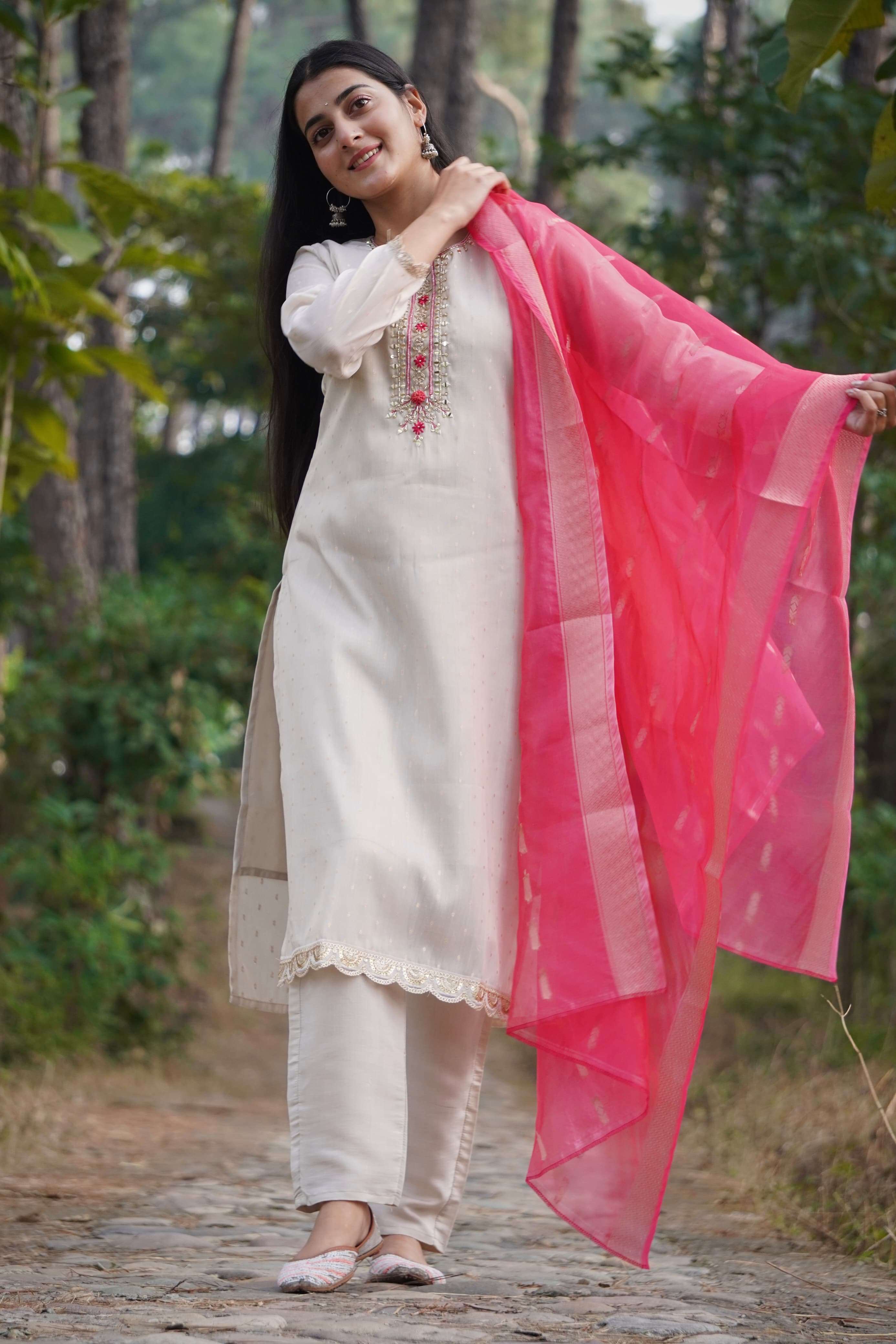 festive special featuring fully elegant premium tissue shimmer suit set which is beautifully decorated with hand khatli work and original mirror work with butti pattern readymade suit