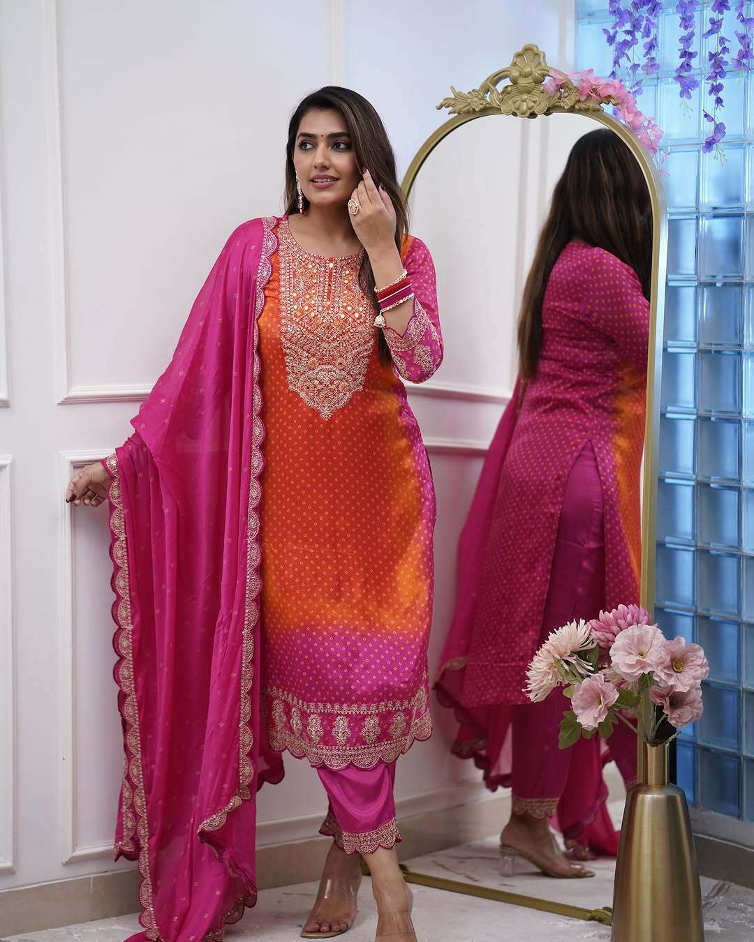 new orange rani original mirror work suit set heavy fully stitchied suit set coding hevay full work heavy suit set which is beautifully decorated with intricate embroidery work zari weaving