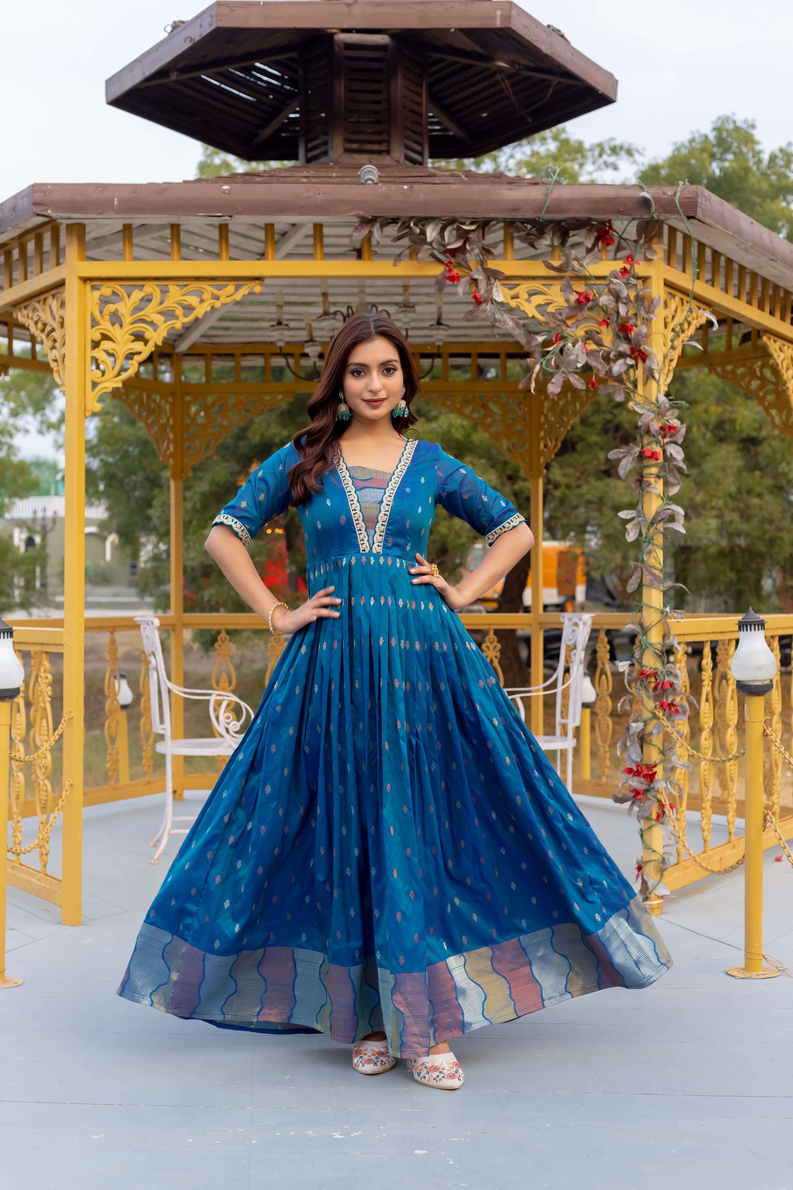 stunning flared gown features a beautifully woven butti design paired with delicate embroidered lace for a touch of elegance four charming colors craft silk size s to 4xl 