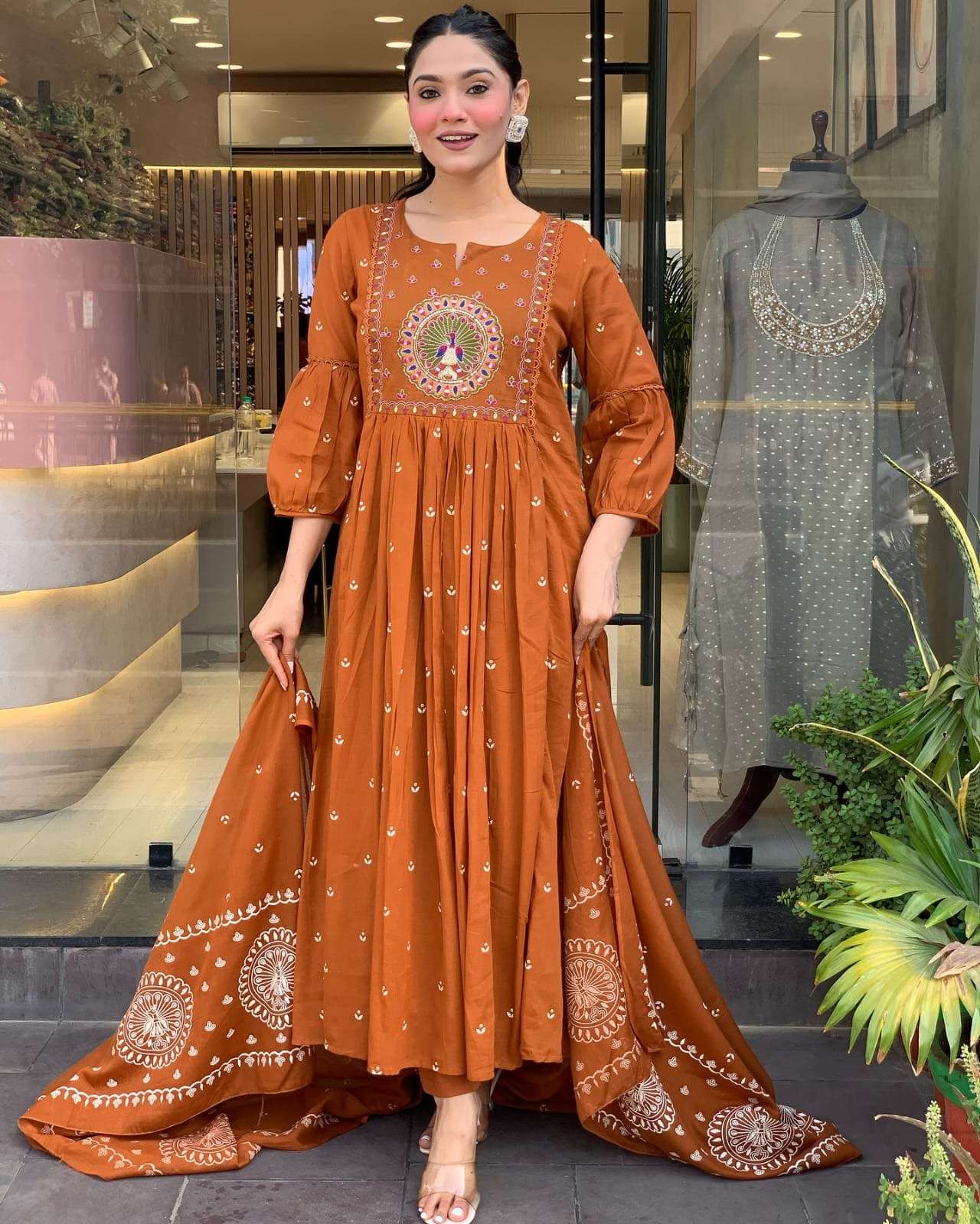 orange mal cotton kurti pant dupatta set elegant orange kurti set this stylish kurti pant dupatta set features a vibrant orange kurti with round butta detailing on the yoke and a flattering pleated design